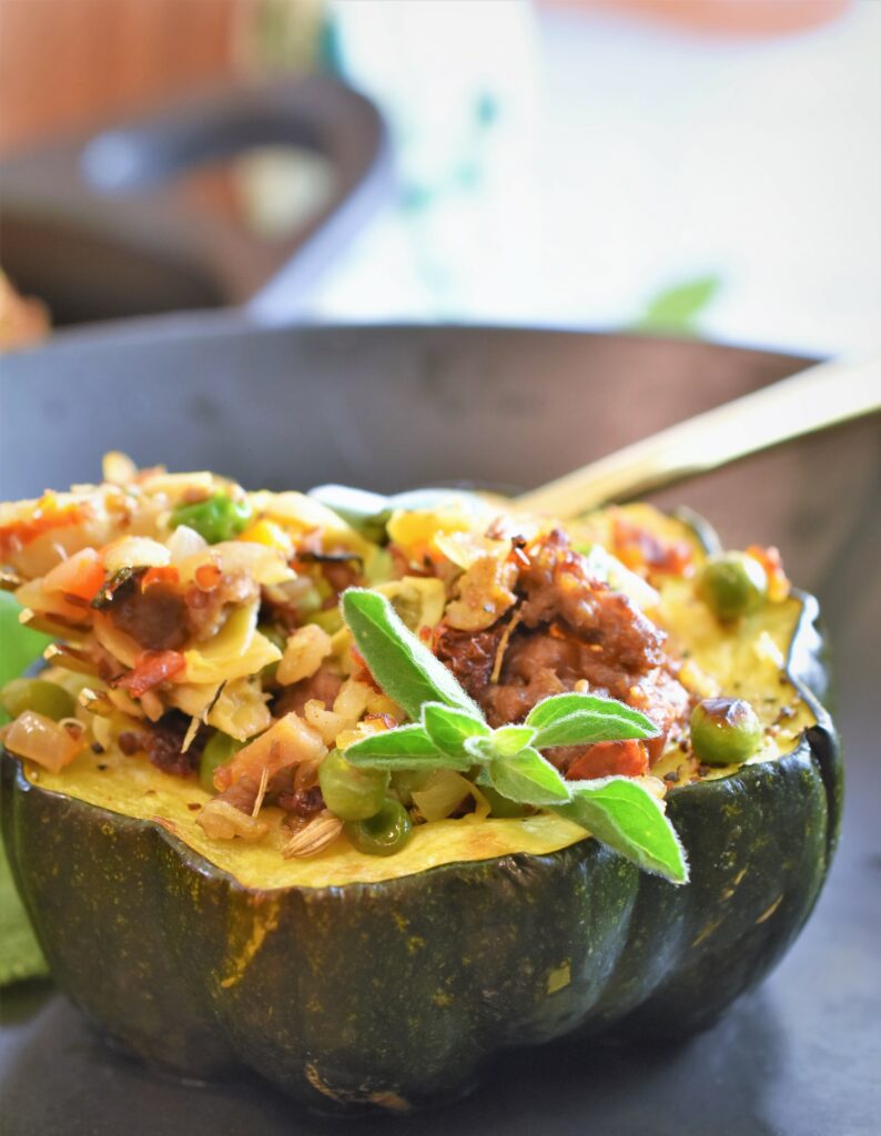 up close image of stuffed squash with sage garnish