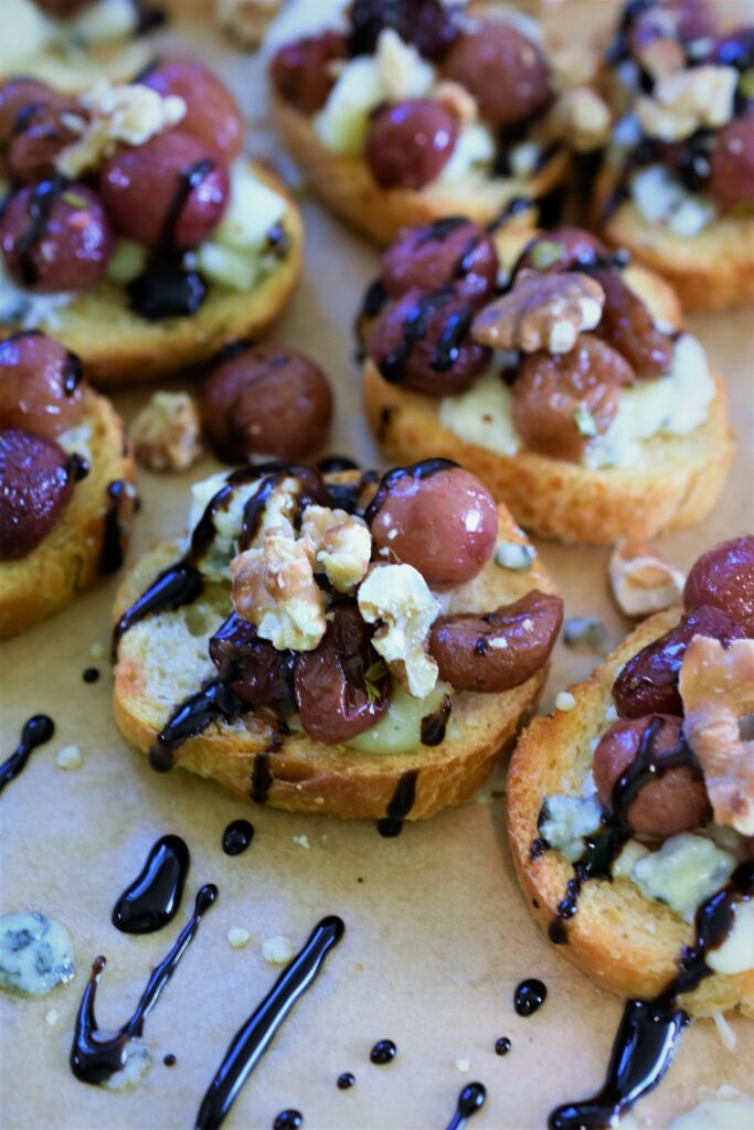 balsamic glaze drizzled on appetizer toasts