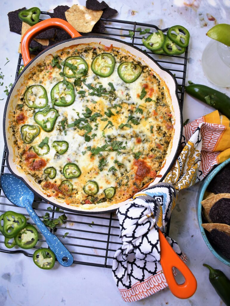 hot dip in orange cast iron pan on cooling rack