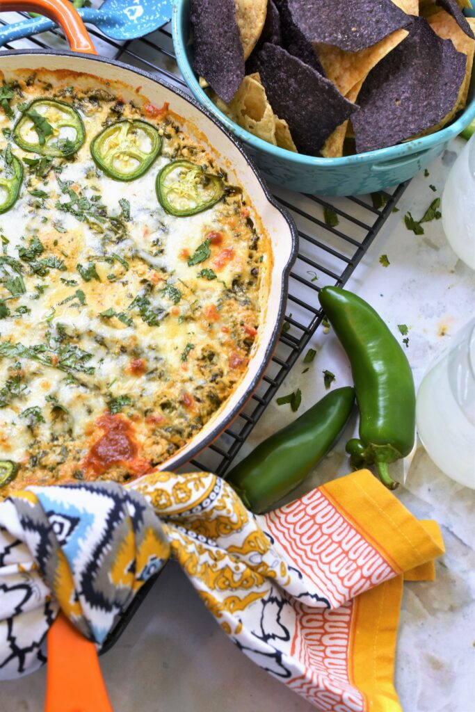 baked jalapeno cojita dip in iron pan