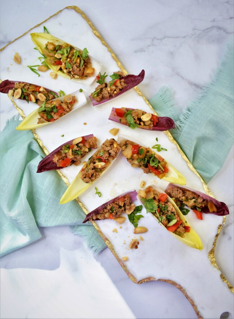  turkey cocktail bites on white marble serving board on mint green napkin