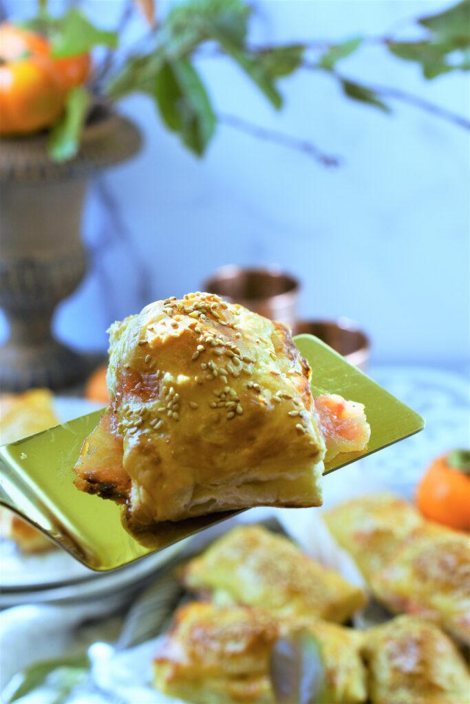 gold spatula serving stuff puff pastry bites