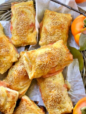 overhead view of persimmon ham and swiss puff pastry bites