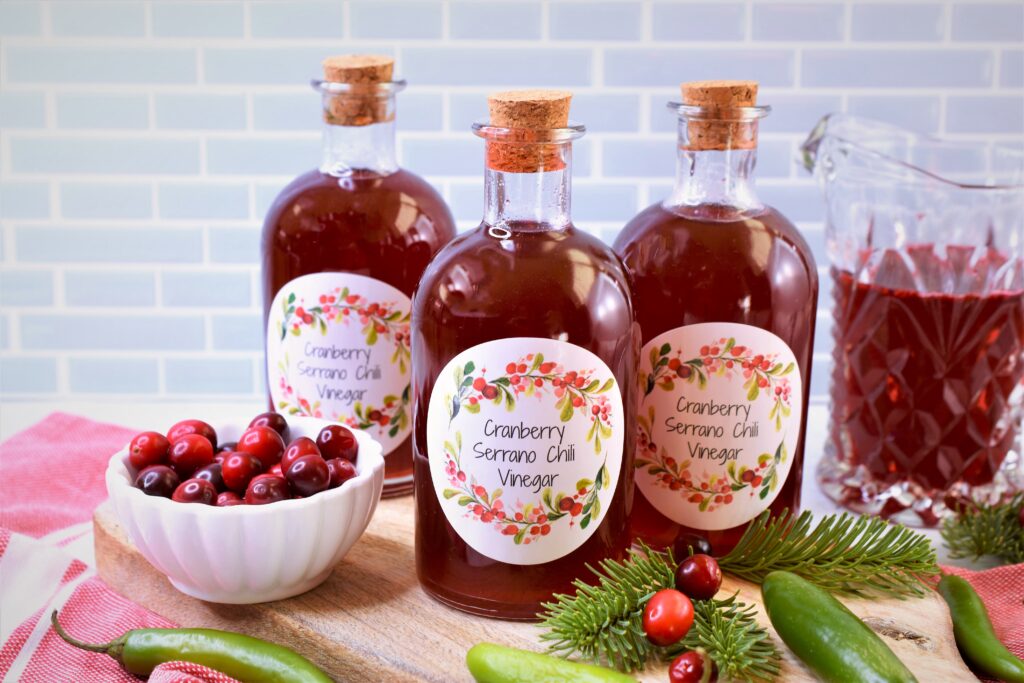 gifts from the kitchen in corked glass bottles on cutting board
